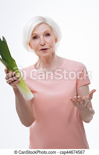 surprised-aged-woman-holding-leek-in-stock-image_csp44674567.jpg.8c8cea201b3036afaf4a9e279956c381.jpg